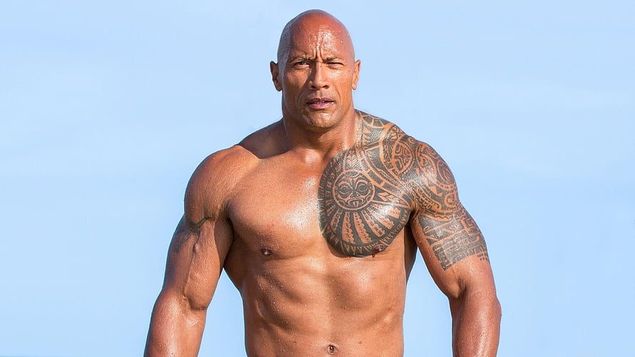 Dwayne Johnson shirtless portrait with Samoan tattoo against a clear blue sky HD wallpaper