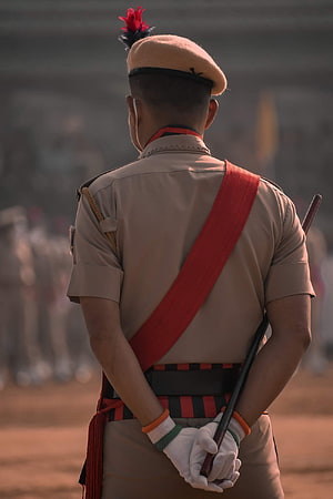 Indian Police Officer in Ceremonial Uniform with Red Sam Browne Strap and Beret HD phone wallpaper