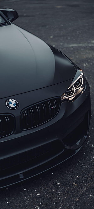 Matte Black BMW M3 Front Grille and Headlight Detail Close-Up HD phone wallpaper