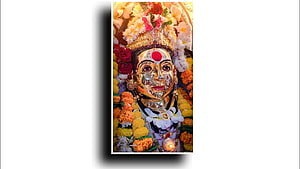 Ekwira Aai Devotee Portrait Adorned With Marigold Garlands And Golden Crown HD wallpaper