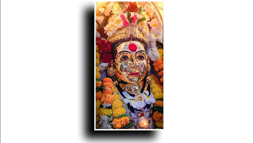 Ekwira Aai Devotee Portrait Adorned With Marigold Garlands And Golden Crown HD wallpaper