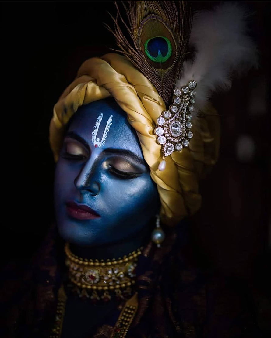 Krishna Portrait with Blue Face Paint, Golden Turban, and Peacock Feather HD phone wallpaper