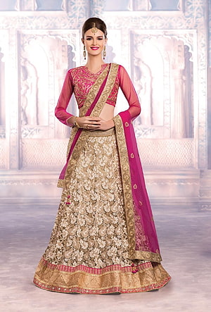 Elegant Pink and Gold Bridal Lehenga Choli with Intricate Zari Embroidery HD phone wallpaper