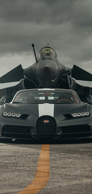 Matte Black Bugatti Divo with White Racing Stripe Parked on Airfield Runway HD phone wallpaper