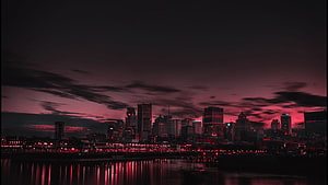 Dramatic Red Sky Over City Skyline With Water Reflections HD wallpaper