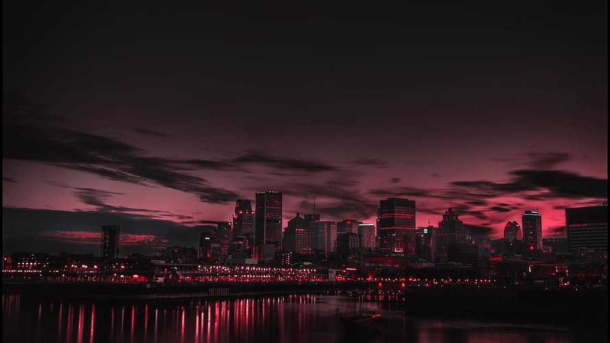 Dramatic Red Sky Over City Skyline With Water Reflections HD wallpaper