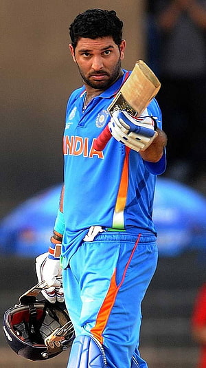 Yuvraj Singh in India Cricket Jersey Holding Bat and Helmet HD phone wallpaper