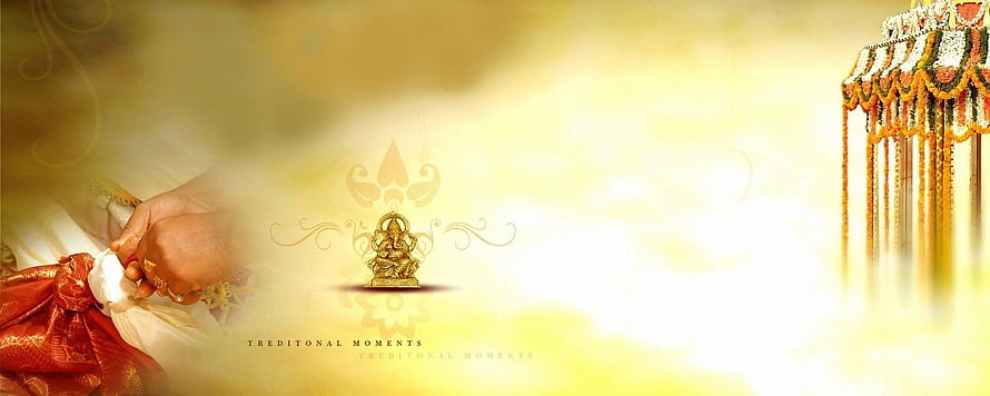Traditional Indian Wedding Ceremony with Ganesha Idol and Floral Decorations HD wallpaper