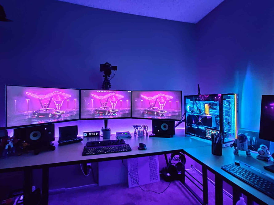 Neon Purple and Blue Triple Monitor Gaming Setup with Star Wars Droids and RGB PC HD wallpaper