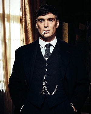 Thomas Shelby in a dark three-piece suit with a watch chain and cigarette HD phone wallpaper