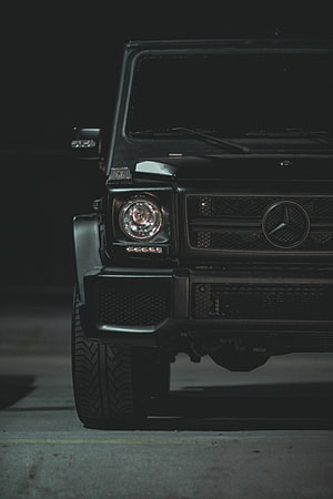 Matte Black Mercedes-Benz G-Class Front View in Dark Night Setting HD phone wallpaper