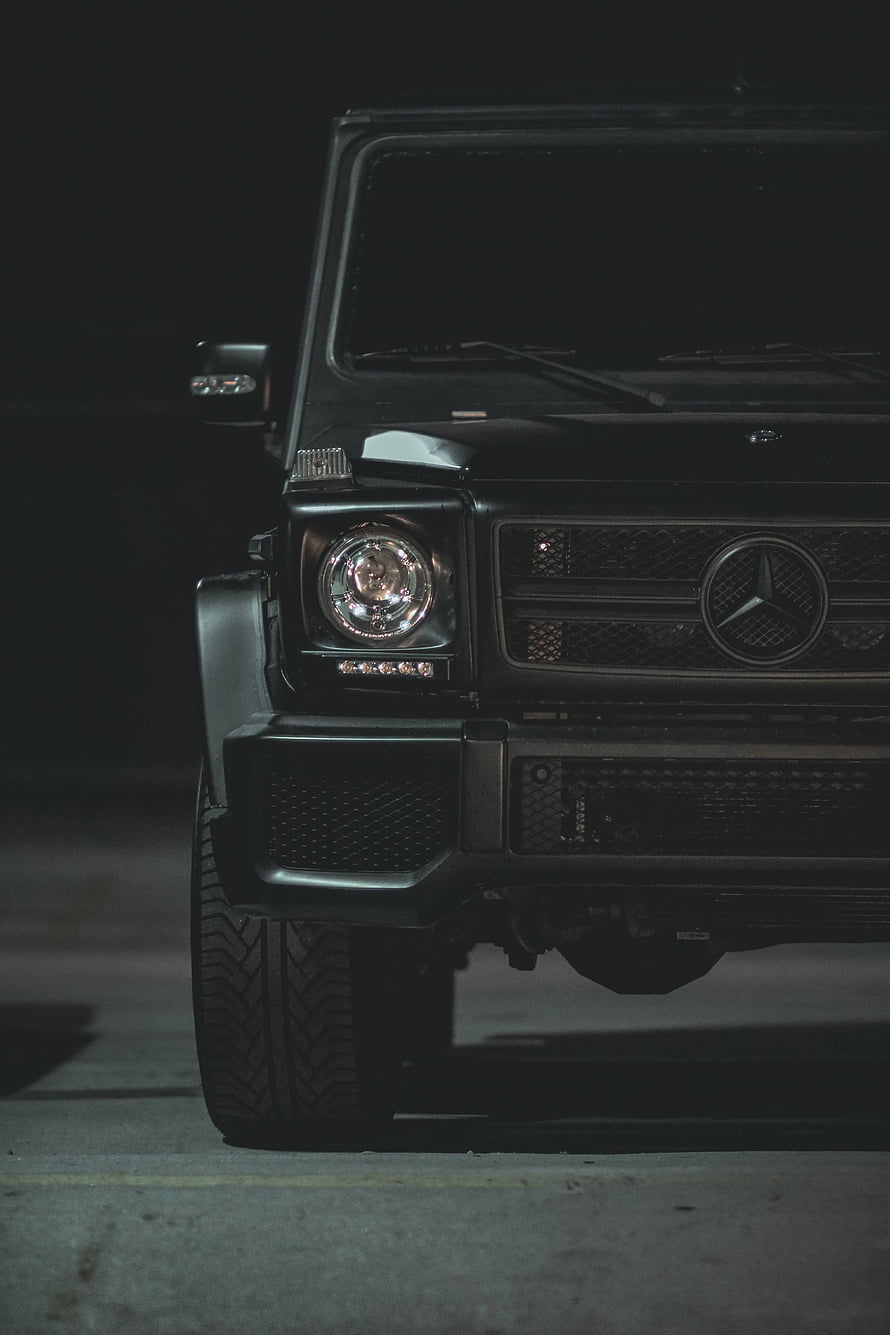 Matte Black Mercedes-Benz G-Class Front View in Dark Night Setting HD phone wallpaper