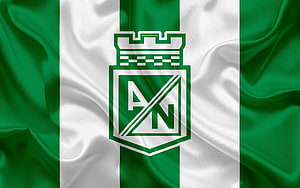 Atletico Nacional Club Crest on Green and White Striped Fabric Background HD wallpaper