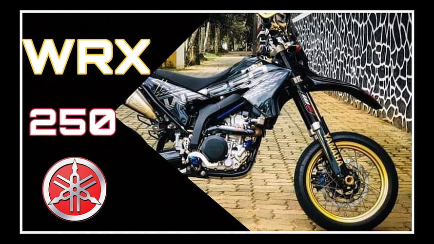 Yamaha WRX 250 Off-Road Motorcycle with Gold Rims and Black Bodywork HD wallpaper