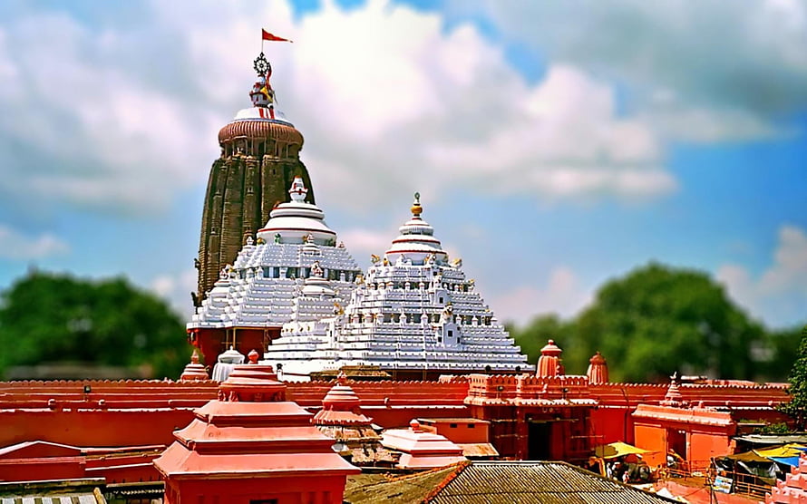 Puri Jagannath Temple Architecture with White Shikharas and Red Walls HD wallpaper