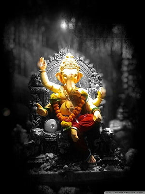 Lord Ganesha Murti Seated on Ornate Throne with Marigold Garland and Lion Guardians HD phone wallpaper
