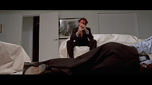 American Psycho Movie Scene of a Bloodied Man in a Suit Sitting on a Bed, American Psycho U Screenshots HD wallpaper