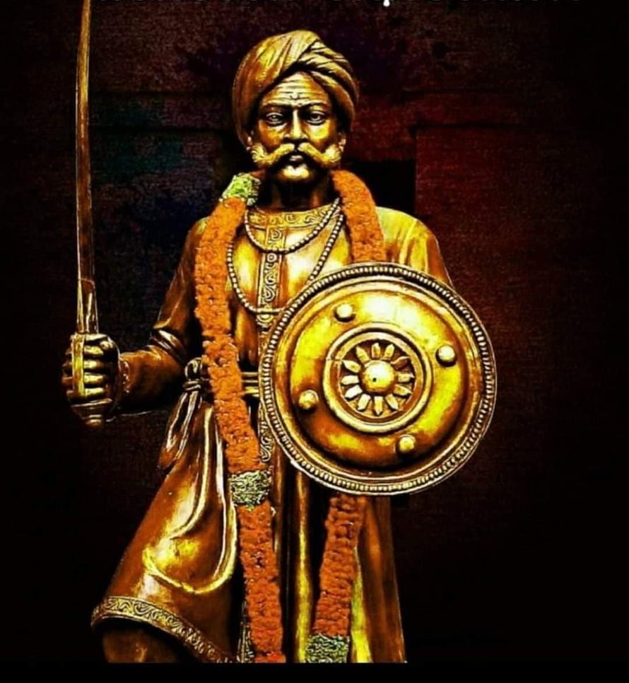 Golden Statue of Kempegowda Holding Sword and Shield with Marigold Garland HD phone wallpaper