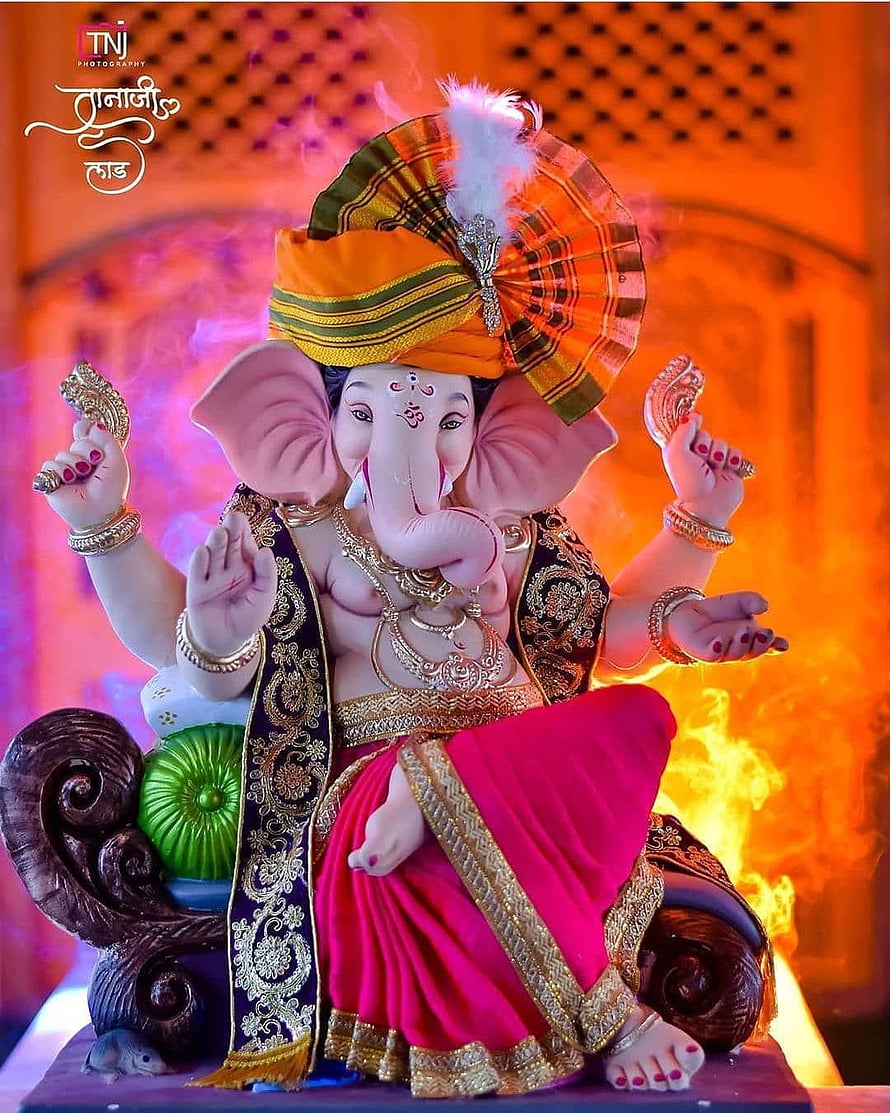 Colorful Ganesha Idol With Orange Turban And Red Dhoti HD phone wallpaper