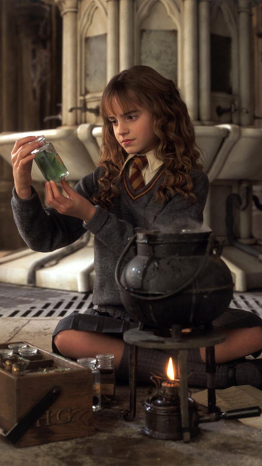 Hermione Granger Brewing Potions in the Hogwarts Classroom HD phone wallpaper