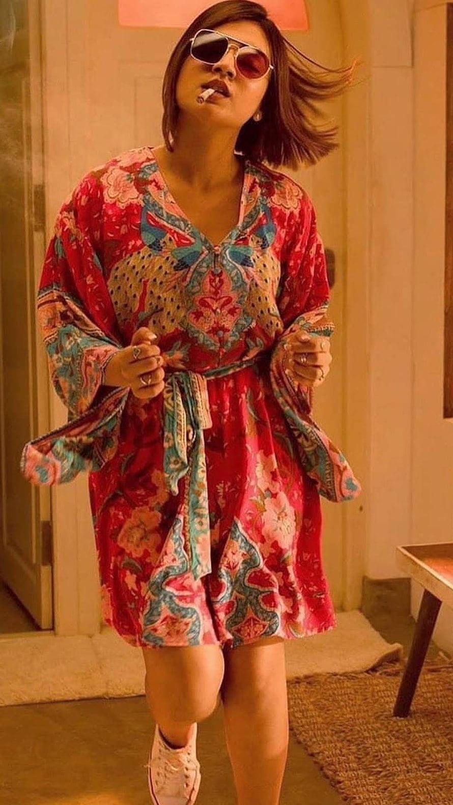 Nazriya as Esther Lopez in Trance wearing a red floral kaftan and aviator sunglasses HD phone wallpaper