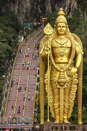 Giant Golden Murugan Statue at Batu Caves Temple in Malaysia HD phone wallpaper