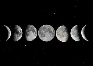 Seven Moon Phases Arranged in a Row Against a Starry Night Sky HD wallpaper