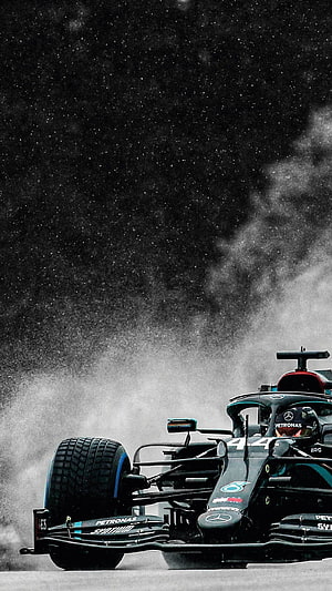Mercedes F1 W14 in the Rain with Lewis Hamilton Driving HD phone wallpaper