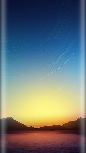 Stunning Star Trails Over Mountain Lake at Sunset HD phone wallpaper