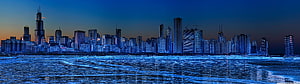 Chicago Skyline at Dusk Over Frozen Lake Michigan with Blue Tones HD wallpaper