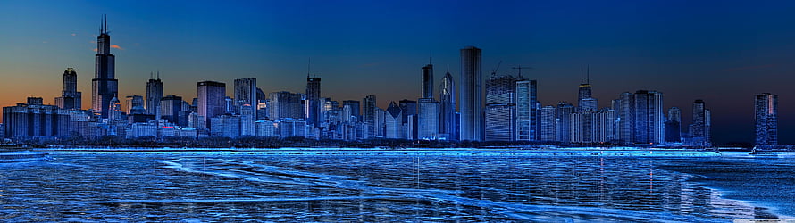Chicago Skyline at Dusk Over Frozen Lake Michigan with Blue Tones HD wallpaper