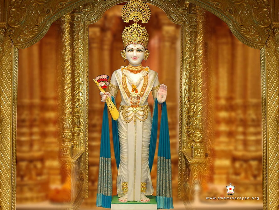 Swaminarayan deity statue in ornate golden temple setting with traditional attire and floral offering HD wallpaper