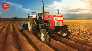 Swaraj 960 FE Tractor Plowing a Field at Sunset HD wallpaper