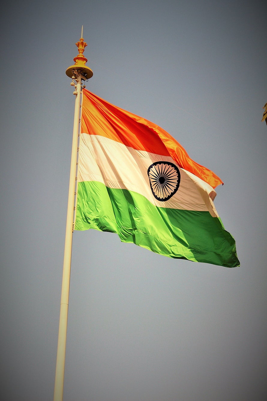 Indian National Flag Waving in the Wind Against a Clear Sky HD phone wallpaper