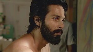 Shahid Kapoor as Kabir Singh in a moody close-up with a full beard and intense expression HD wallpaper