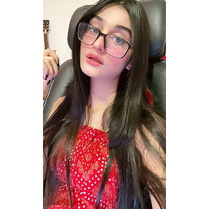 Payal Gaming Portrait in Red Floral Top and Glasses HD phone wallpaper