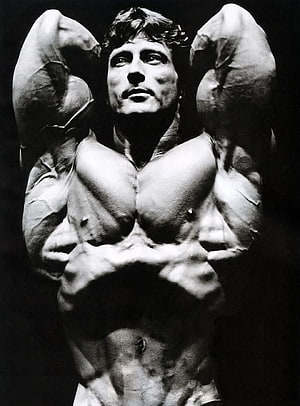 Frank Zane Classic Bodybuilding Pose in Dramatic Black and White Photography HD phone wallpaper