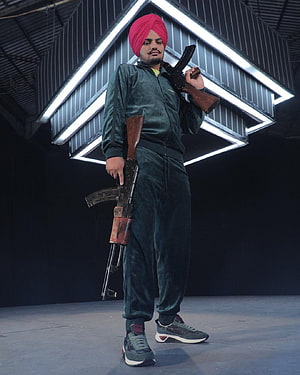 Man in Green Tracksuit and Pink Turban Holding Two Rifles, Sidhu Moose Wala Latest, #sidhu moose wala HD phone wallpaper