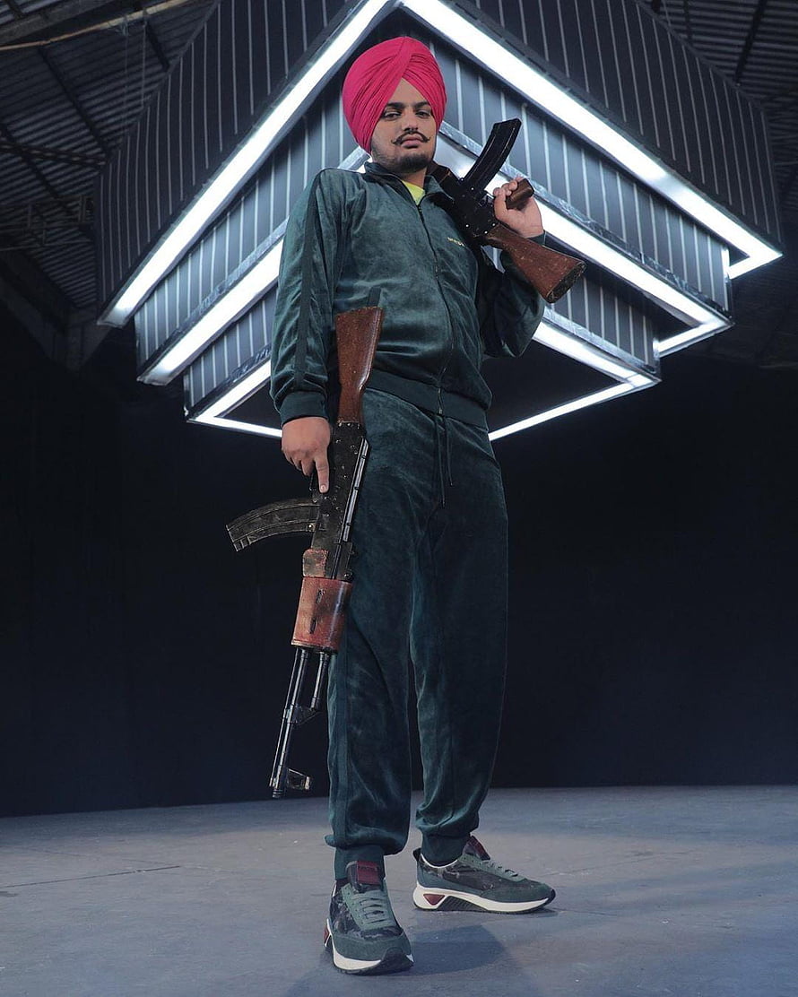 Man in Green Tracksuit and Pink Turban Holding Two Rifles, Sidhu Moose Wala Latest, #sidhu moose wala HD phone wallpaper