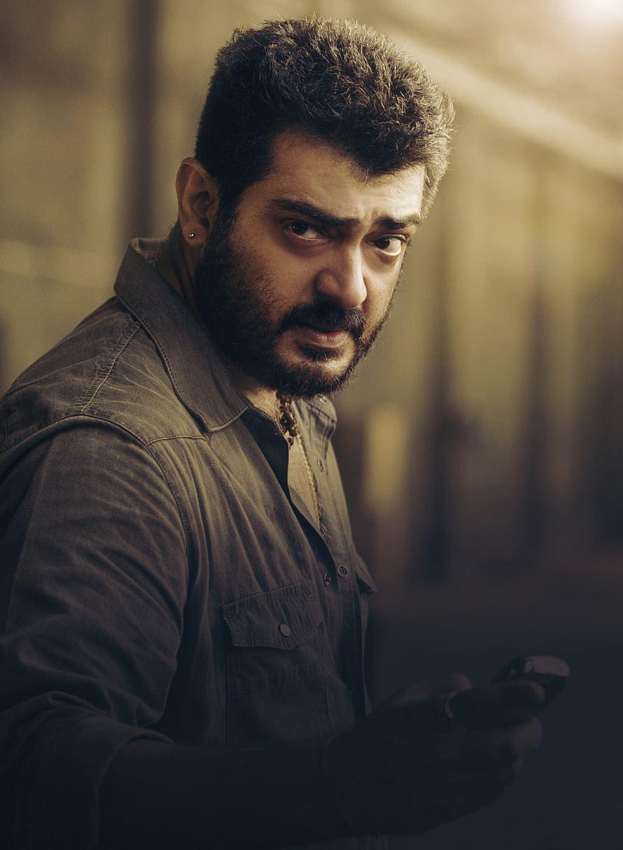 Portrait of a man with a beard looking back over his shoulder with an intense expression, Ajith Kumar Latest, ajith kumar HD phone wallpaper