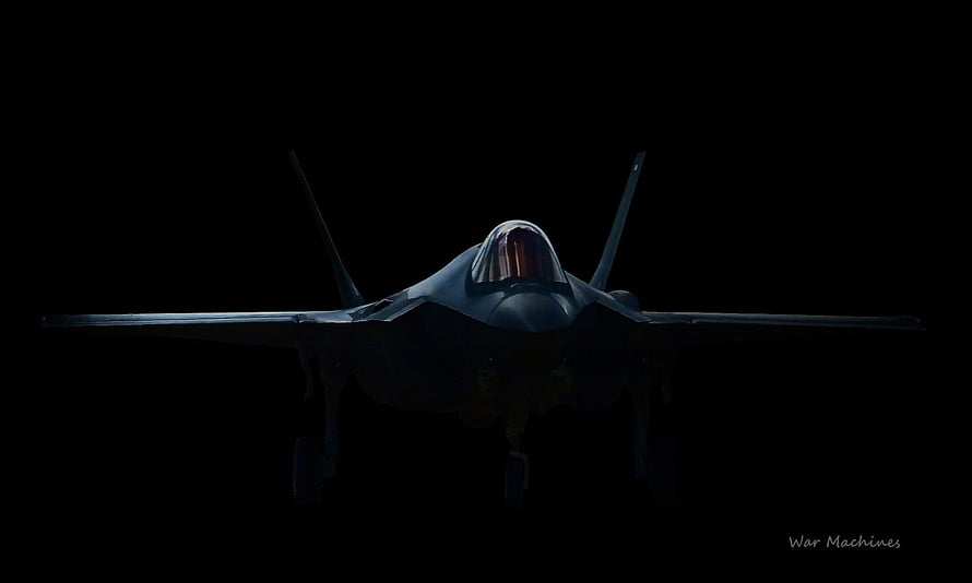F-35 Lightning II Stealth Fighter Jet Silhouette Against Dark Night Sky HD wallpaper