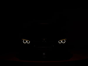 BMW Angel Eyes Headlights Illuminated in Darkness HD wallpaper