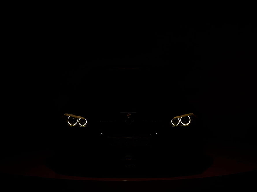 BMW Angel Eyes Headlights Illuminated in Darkness HD wallpaper