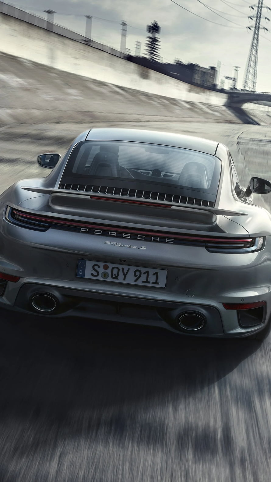 Rear View of a Silver Porsche 911 Turbo S Driving on a Highway HD phone wallpaper