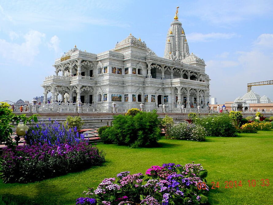 Prem Mandir Temple in Vrindavan with Lush Gardens and Vibrant Flower Beds HD wallpaper