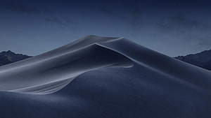 macOS Catalina Default Desktop Wallpaper Featuring Flowing Sand Dunes Under a Starry Night Sky HD wallpaper