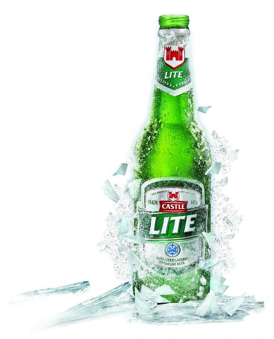 Chilled Castle Lite Beer Bottle Shattering Through Ice on White Background HD phone wallpaper
