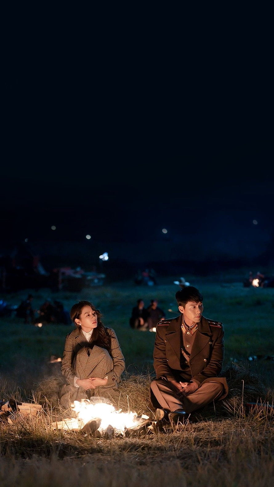 Crash Landing on You: Hyun Bin and Son Ye Jin by the Campfire at Night HD phone wallpaper