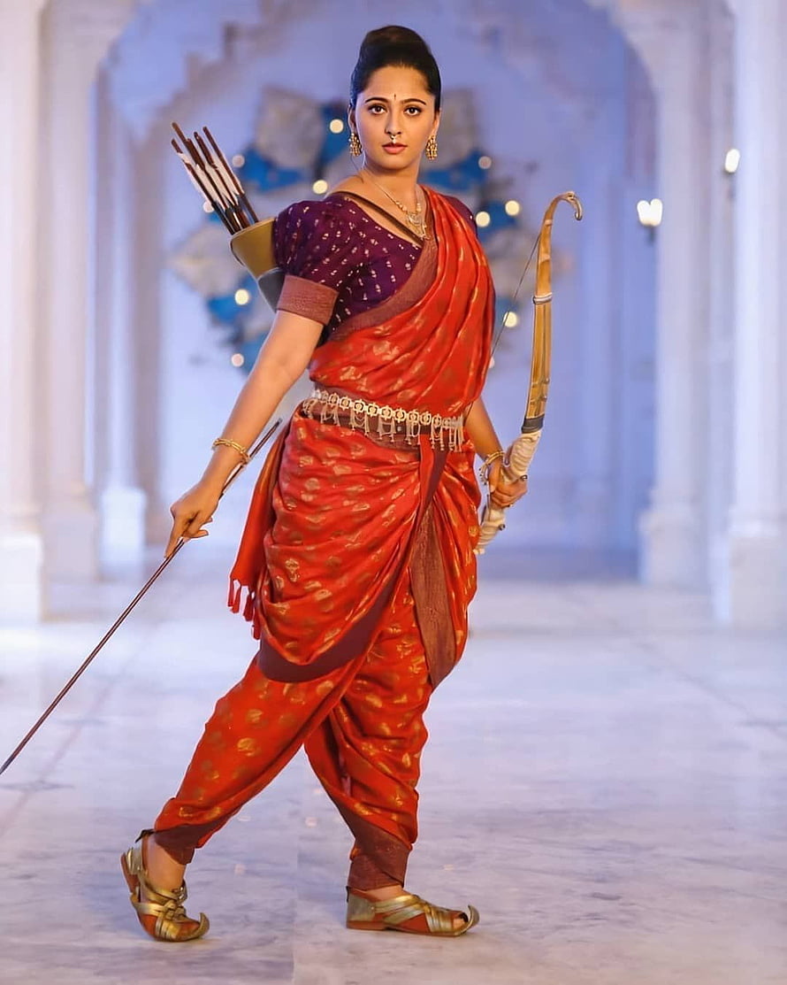 Anushka Shetty as Rani Sita in Bahubali with Bow and Arrows HD phone wallpaper