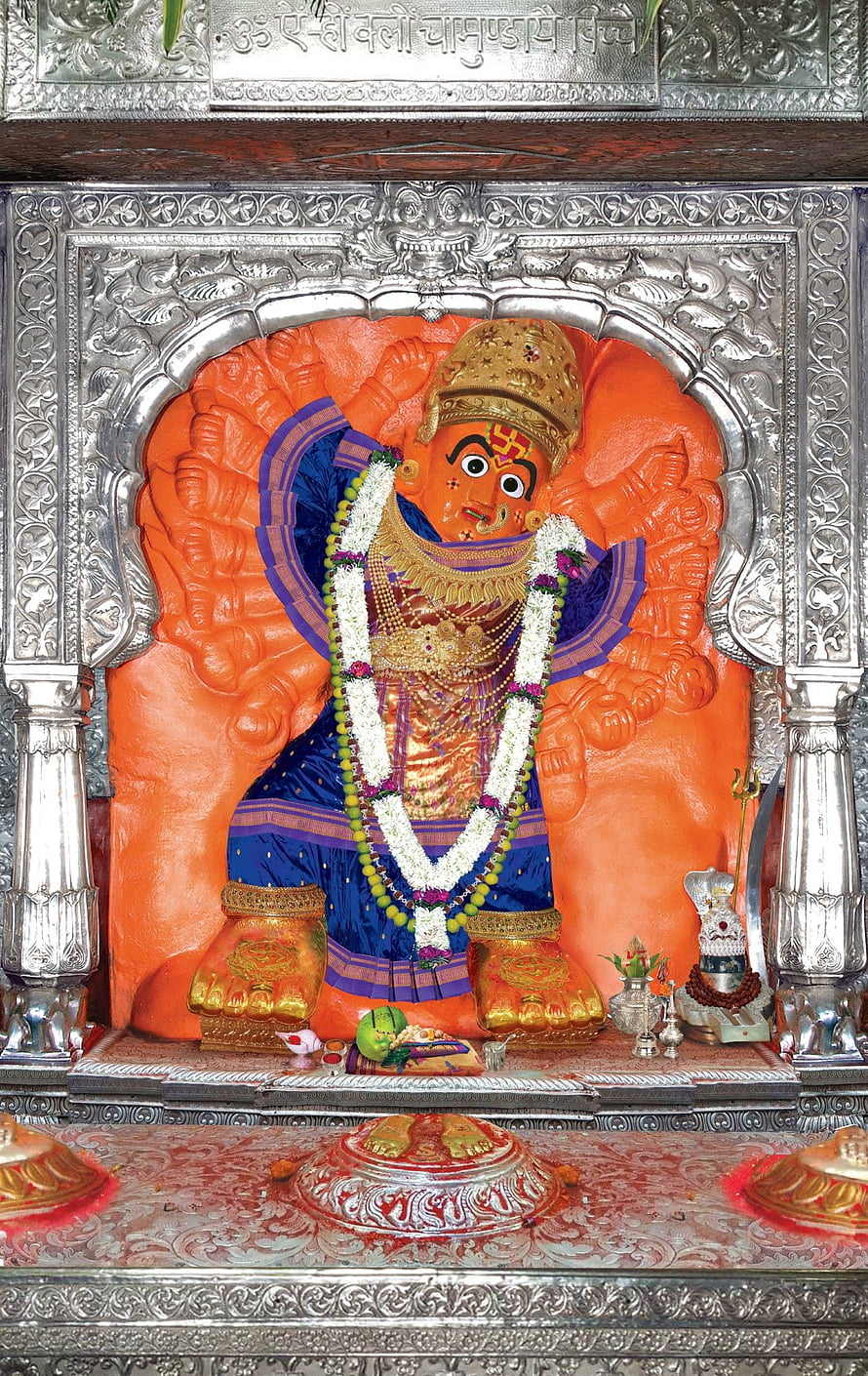 Vibrant Statue of Ayyappa God in Blue Robes with Silver Temple Shrine HD phone wallpaper